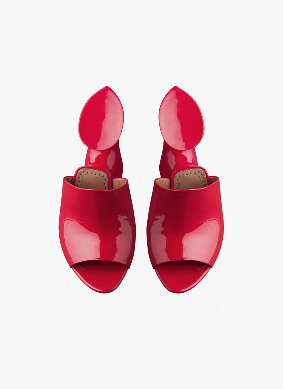 La Sculpture mules in calfskin ALAÏA LACQUER RED LA SCULPTURE MULES IN CALFSKIN